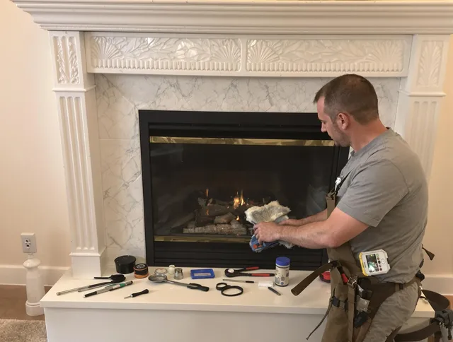 Lyndhurst Chimney Sweep performing fireplace maintenance in Lyndhurst, OH
